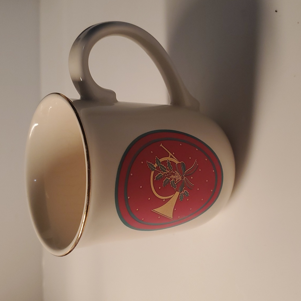 Vintage 1988 Hallmark Christmas Mug with Red and Gold Design.